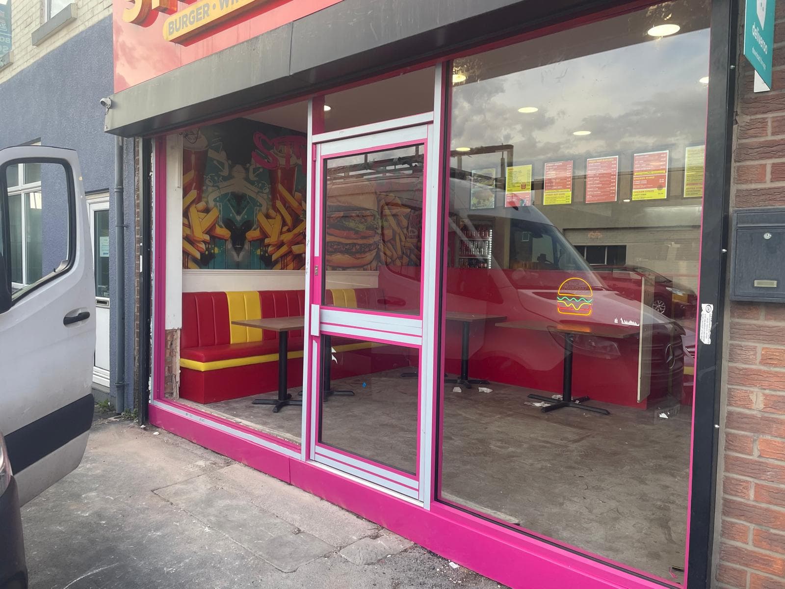 Bespoke retail shopfront with powder-coated aluminium frame